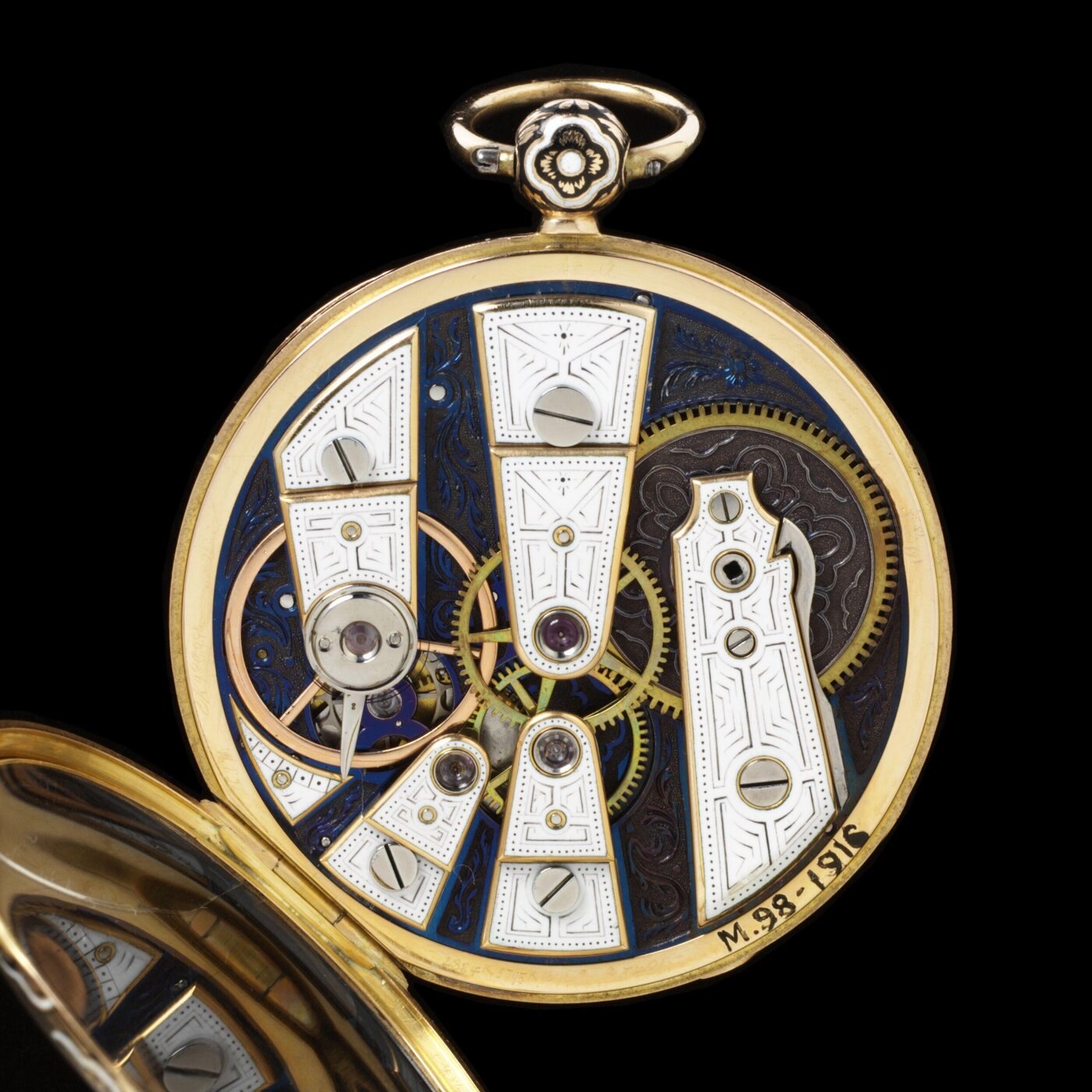 Movement of the watch showing blue enamel plates, bridge construction, and cylinder escapement.