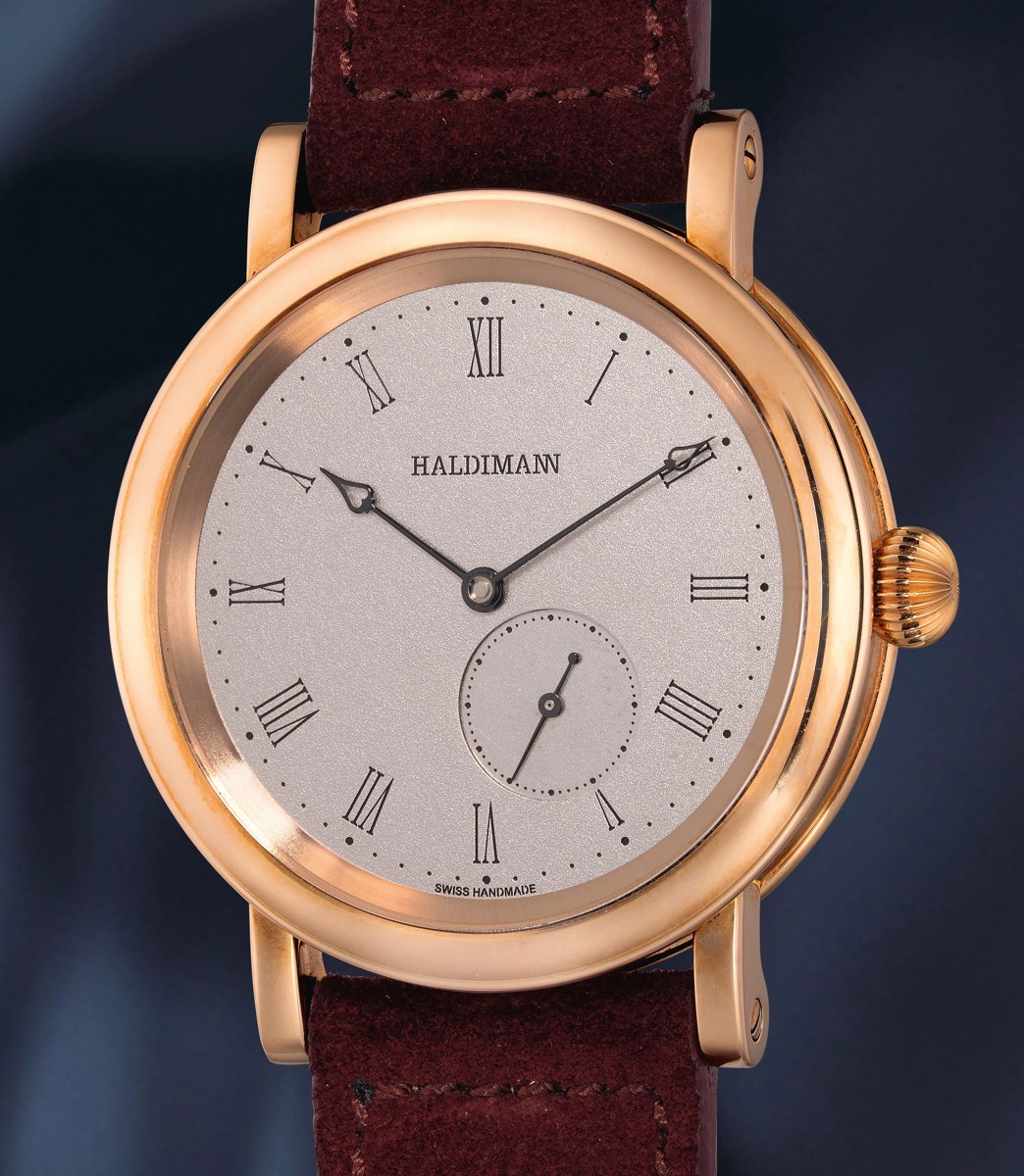 Front view of Haldimann H11/12 pink gold wristwatch with frosted dial and subsidiary seconds