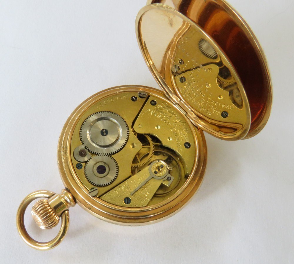 Open back view showing the Lancashire Watch Co Ltd movement and inner dust cover